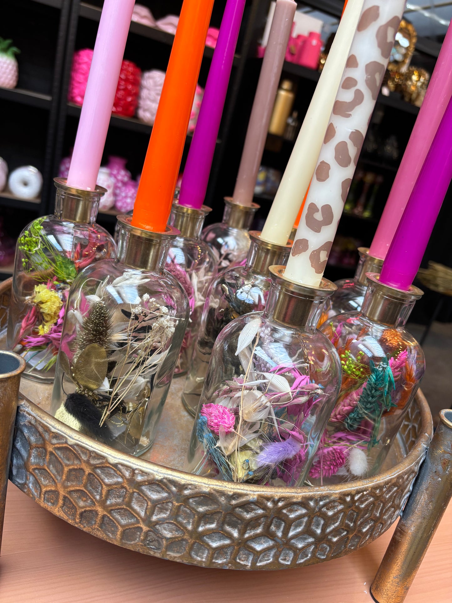 Droogbloemen in glazen kaars flesje